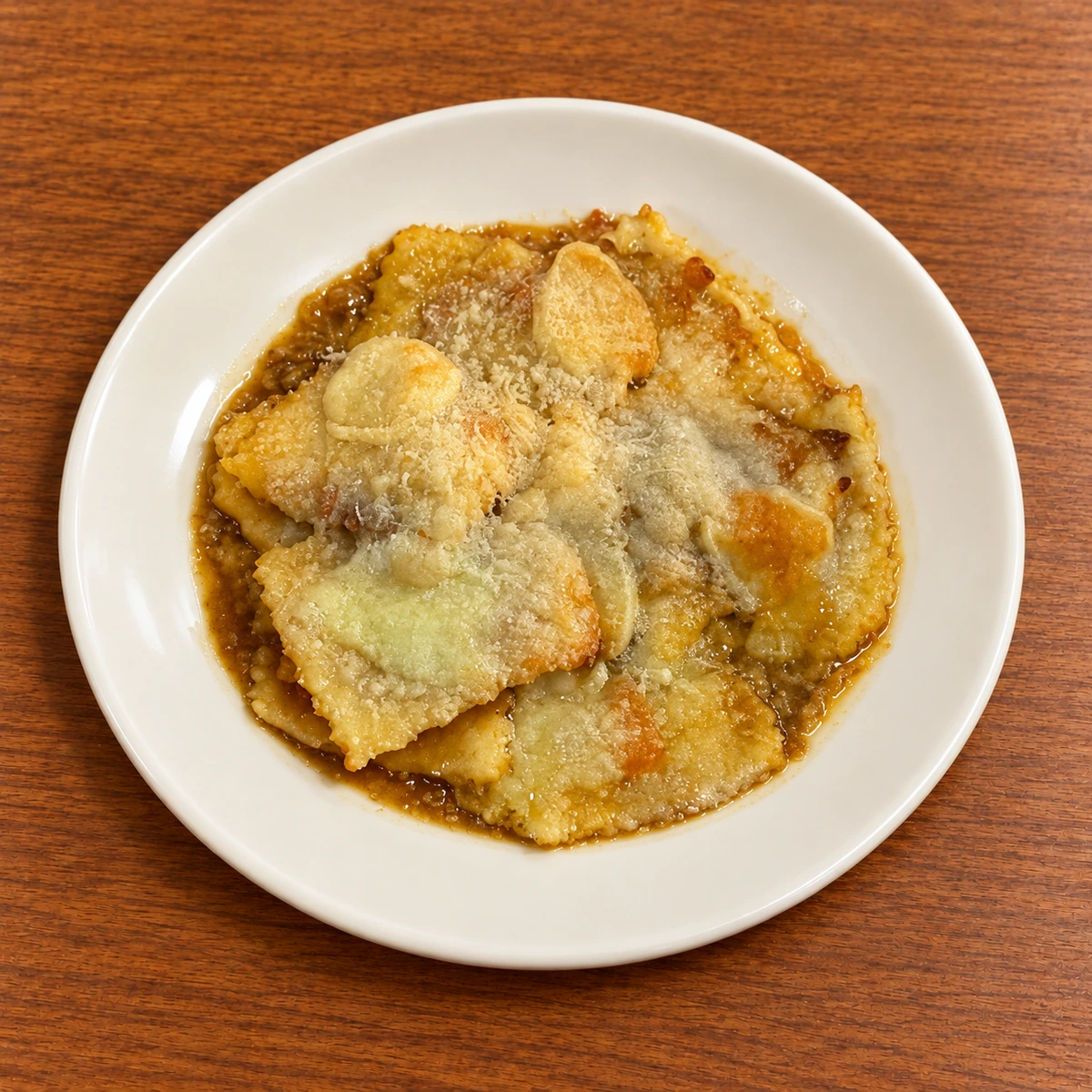 Piatto gratinato al forno con crosticina dorata e cuore morbido